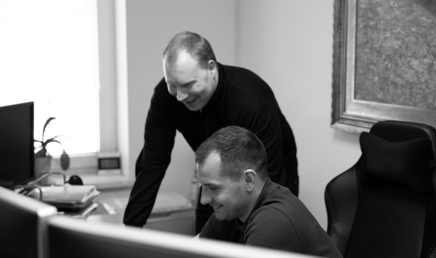 Two colleagues reviewing a campaign